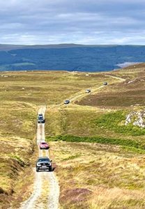 Convoy of 4x4s on way to Laggan a bhainne