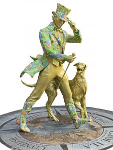 Statue of Johnnie Walker with his dog